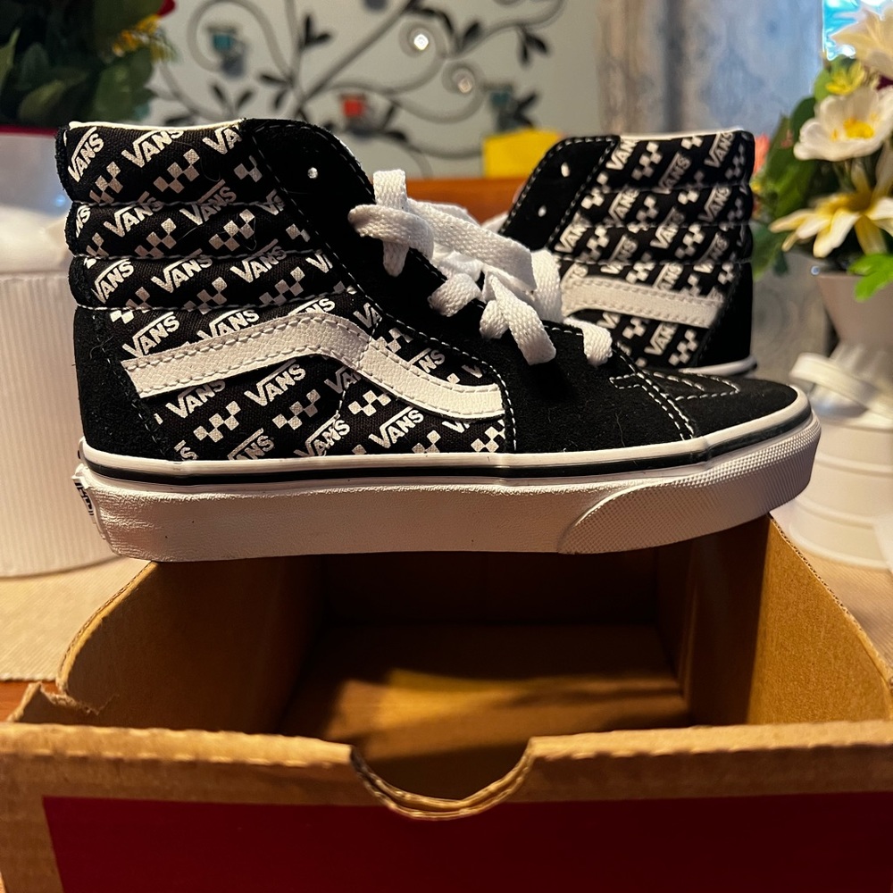 Brand new size 13.5 boys high top black and white Vans sneakers